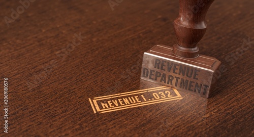 A revenue department rubber stamp gracefully positioned on a wooden desk, visually � Financial Planning and Investment Strategy Concept for Business Growth