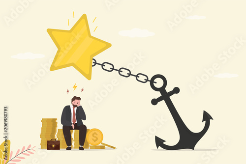 Obraz na płótnie Stressed businessman sits on piles of coins, looking at star held down by heavy anchor