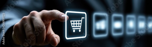 A finger presses a glowing shopping cart icon on a futuristic interface