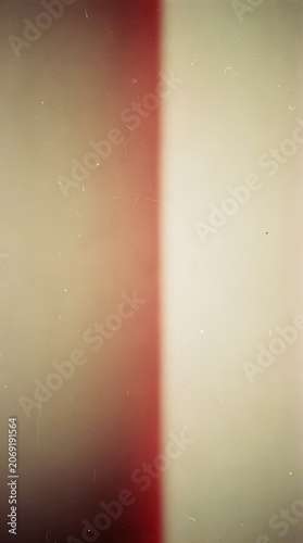 Vintage film light leak overlay with authentic dust and grain texture.