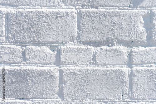 Fotografija The texture of a painted brick wall