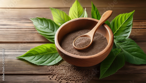 Wooden Bowl With Seeds Spoon And Fresh Green Leaves