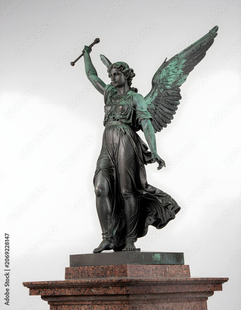 Obraz premium Elegant bronze archangel statue isolated on white, highlighting classical craftsmanship, spirituality, faith, and timeless religious art traditions.