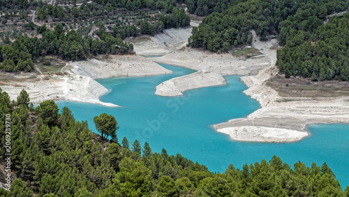 Fotografie Reservoir with low water levels showing severe drought