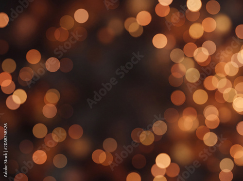 Golden bokeh lights on dark background