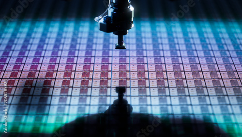 Photos Close-up of Colorful Semiconductor Wafer during Microchip Packaging Process