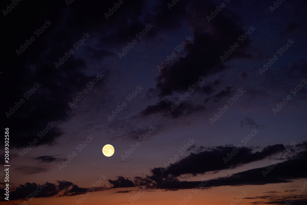 Fototapeta premium Full Moon on a twilight background.