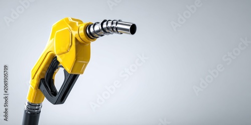 Yellow fuel nozzle isolated on a light background representing the concept of supply