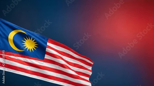 Malaysian flag waving against abstract blue and red background