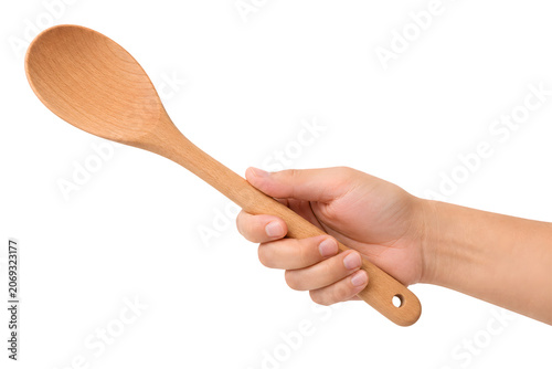 hand holding a wooden cooking spoon isolated on transparent background