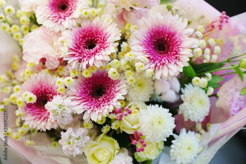 Elegant flower bouquet with pink gerbera daisies and white roses top view