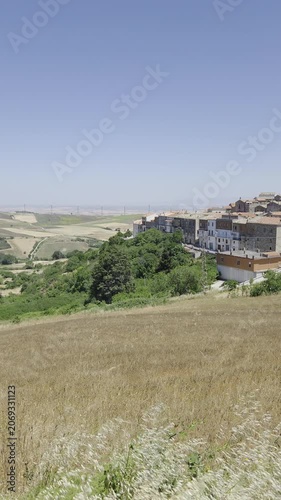 A summer countryside landscape of Motta Montecorvino, a village in the province of Foggia, Italy.