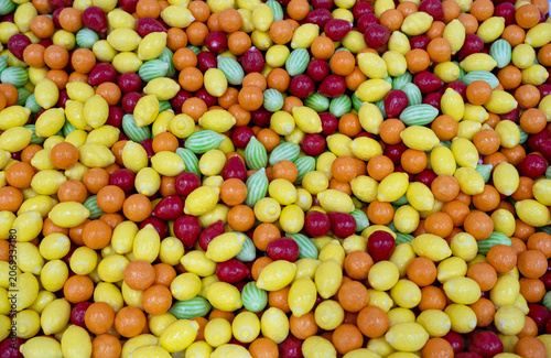 Fruit flavored jelly candies coated in a sour sugar mixture