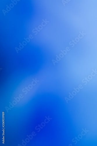 Soft blue hues blend into a dreamy, abstract gradient
