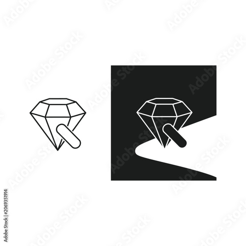 Two gemstones one with a handle on a black background precious stone diamond shape