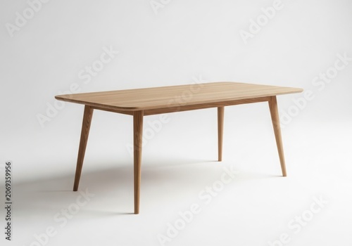 A Light Wooden Table With Four Tapered Legs