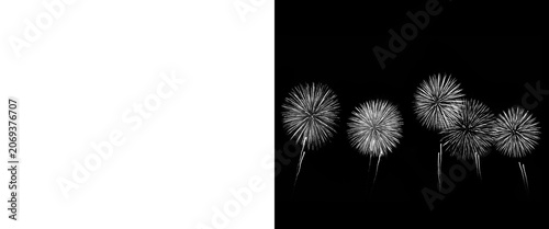 Konstfotografi Monochrome fireworks display on black background, minimalist black and white pyr