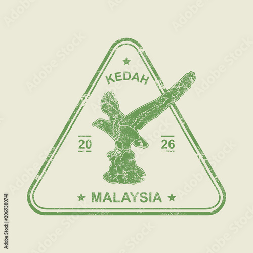 Vintage passport stamp featuring Dataran Lang landmark in Langkawi, Kedah, Malaysia. Grunge travel badge with eagle monument illustration in triangular stamp design.