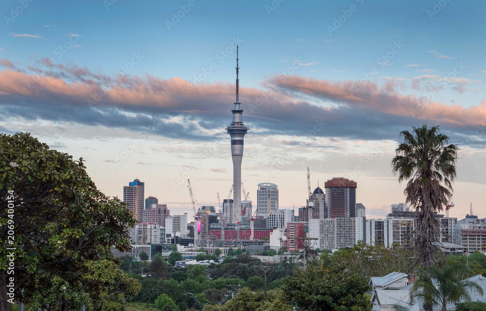 Fototapeta premium Skyline of Auckland city at dusk with Sky tower New Zealand. View from Ponsonby