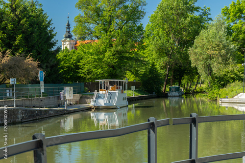 White boat docking on Bata canal in Straznice