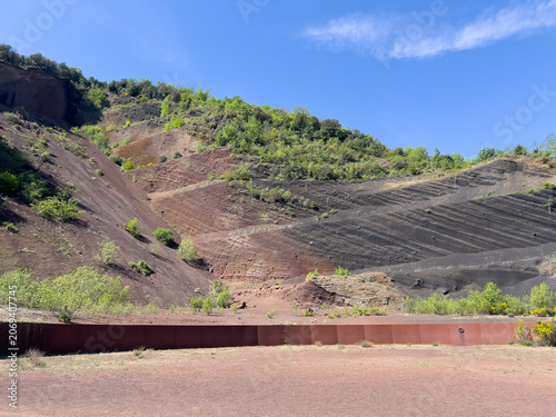 Volcanic landscape showing layered ash and rock in Olot, Catalonia