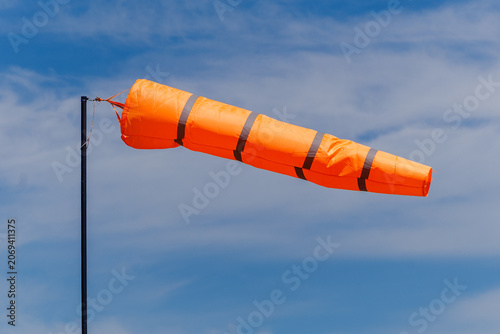 Windsock Blowing in the Wind Against Blue Sky