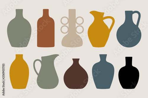 Photography Collection of abstract ceramic vases and jugs in muted earthy tones