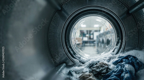 Inside a Front Loading Washing Machine During a Laundry Cycle