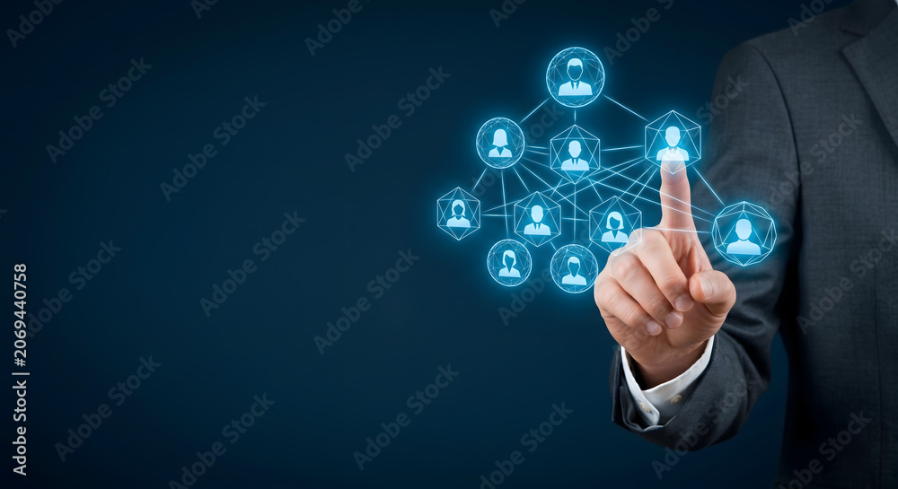 Fototapeta premium Hand touching glowing social network connection map representing global communication and teamwork link.