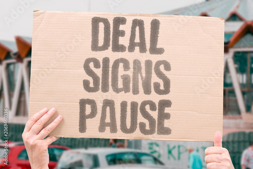 Konstfotografi "Deal signs pause" Agreement creates temporary break in hostility