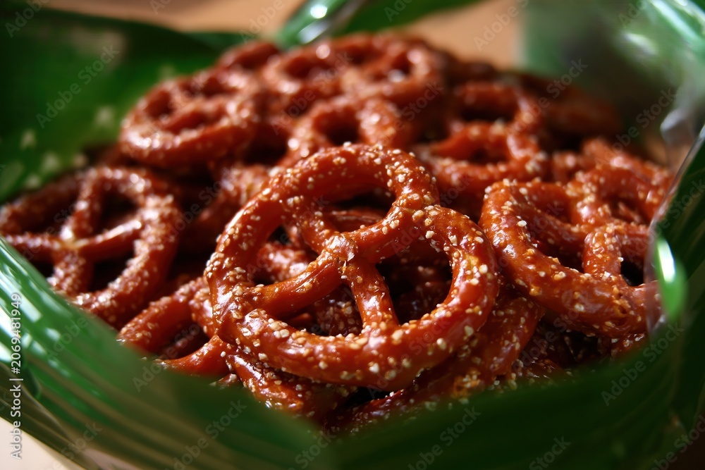 Fototapeta premium Crunchy Pretzels in Green Bowl