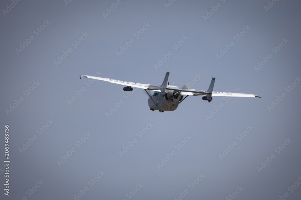 Fototapeta premium Light utility aircraft flying propeller driven cargo plane