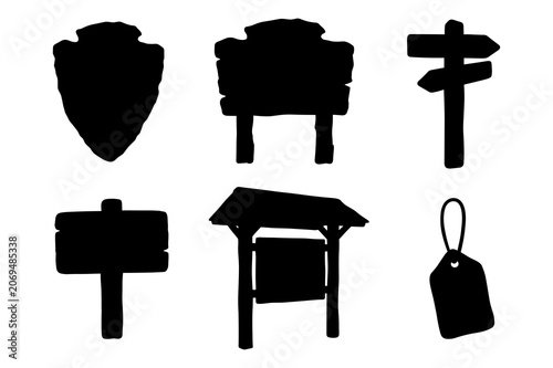 Collection of wooden park signs and trail markers silhouettes.