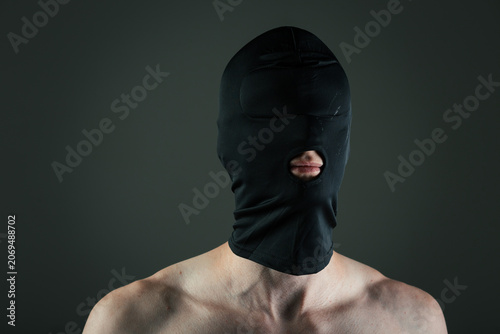 Canvastavla Athletic man in boxers and a black mask covering his face