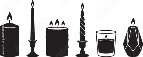 Konstfotografi Collection of lit candles in various shapes and holders