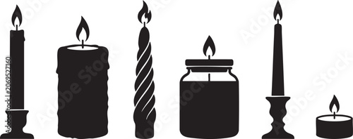 Cuadro en lienzo Black silhouette collection of five lit candles in various shapes and sizes on w