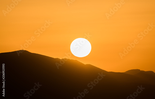 Mountain Sunset with Heatwave Atmosphere and Rising Global Temperatures Concept