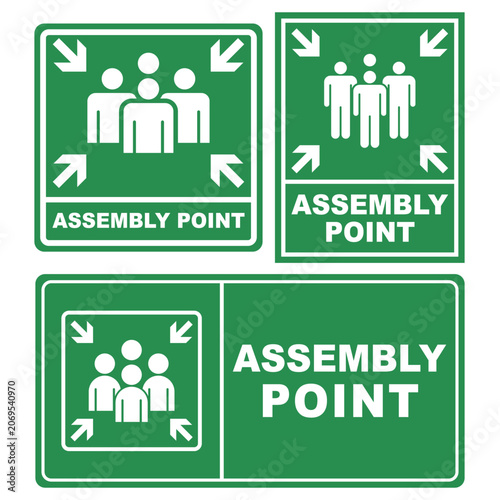 Assembly Point Signs: Clear and concise signs indicating the assembly point for gatherings or emergency situations, featuring pictogram representations of people and directional arrows.