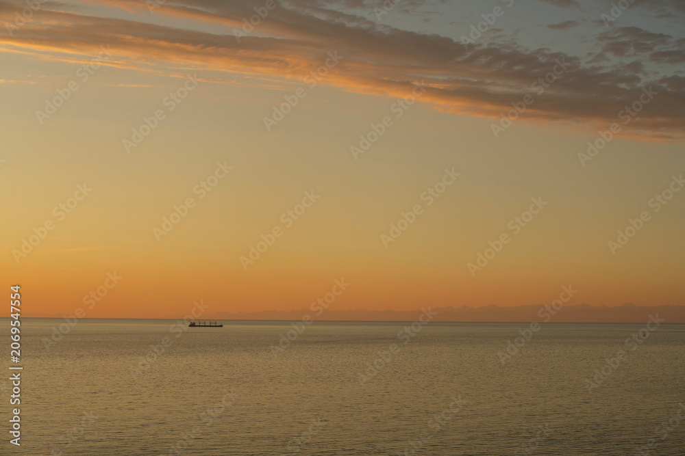 Fototapeta premium Beautiful sunset over the sea. Evening sea landscape