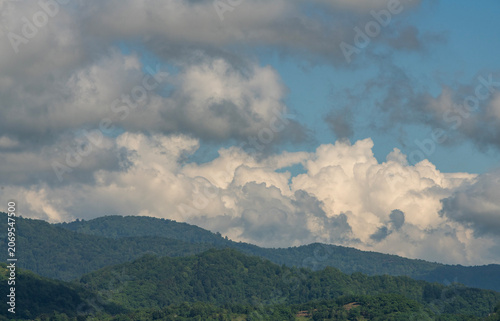 Sunset with clouds over the mountains.