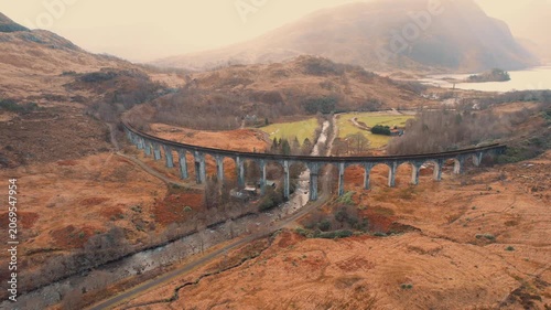 the Glenfinnan Viaduct, a renowned concrete railway viaduct located in Scotland.