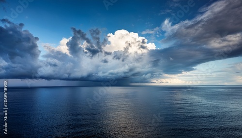 A Serene Landscape Featuring Dramatic Clouds Above A Calm Sea Evoking Tranquility And The Beauty Of Nature