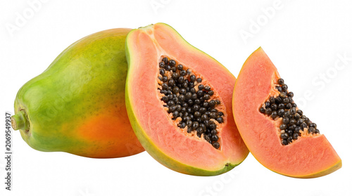 Fotografie Fresh whole and sliced papaya fruit showing orange flesh and seeds