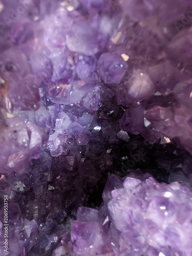 Deep Inside an Amethyst Geode Revealing Layered Purple Crystals and Mystical Shadows