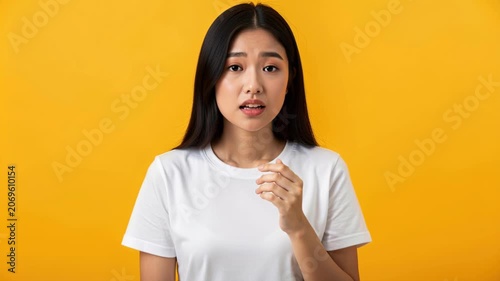 Young Asian Woman with Expression of Surprise