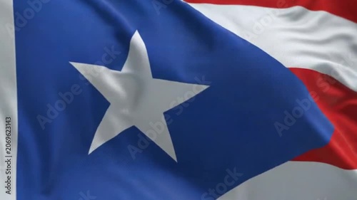 Flag of puerto rico waving in the wind against a green screen background