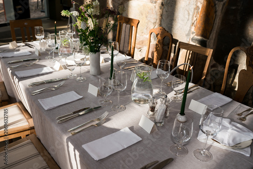 Canvastavla Sophisticated Wedding Reception Tablescape with Crystal Glassware, Floral Arrang