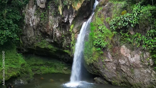 Captivating drone footage showcasing the majestic Brisas Waterfall in Cuetzalan, Mexico. Serene nature.