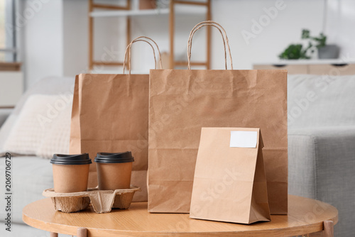 Paper bags with coffee cups...