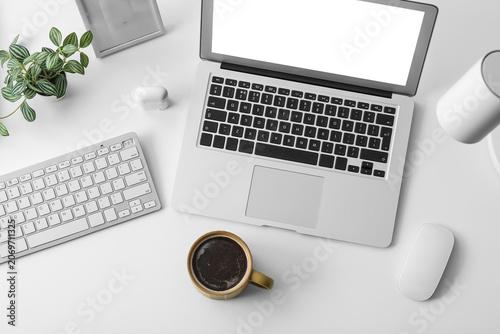 Cup of coffee with laptop, ...